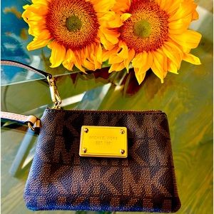 Micheal Kor mini wristlet wallet…. Brown with MK logo.